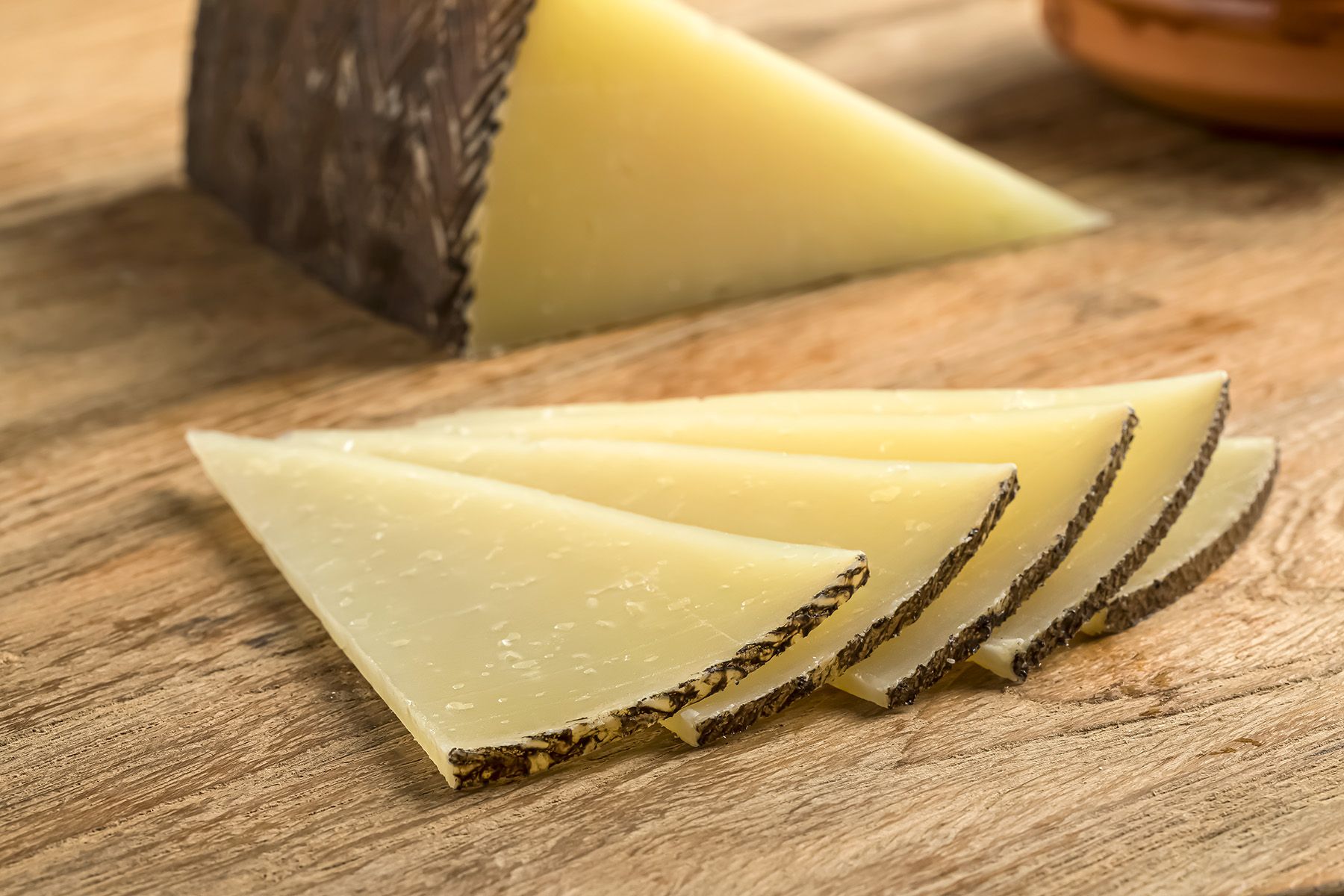 Manchego cheese, sliced for sandwiches