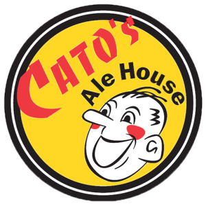 Round yellow Cato's Ale House badge with red lettering and a laughing cartoon mascot face