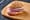 Bismarckhering brotchen: a vinegar-cured herring fillet with raw onion rings in a German bread roll.