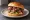 Ahi Poke Sandwich: an illustration of maggi seasoning sauce, olive oil, avocado and mayonnaise on burger bun.