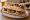 Almuerzo Valenciano: an illustration of pork on baguette.