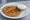 Aloo Paratha with Curd: an illustration of potato and yogurt on naan.