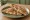 Arayes Jibneh (عرايس جبنة): an illustration of cheese on pita.