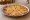 Arizona Cheese Crisp Sandwich: an illustration of cheese on tortilla.