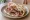 Arni se Pita (Αρνί σε Πίτα): an illustration of lamb on pita.