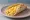 Austin Breakfast Taco: an illustration of egg on tortilla.