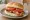 Bacon and Tomato: an illustration of bacon, tomato and butter.