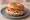 Bagel met Zalm: an illustration of salmon and cream cheese on bagel.