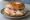 Bagel with Sturgeon: an illustration of cream cheese on bagel.