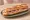 Baguette Brötchen: an illustration of ham on baguette.