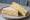 Banana and Custard Sandwich: an illustration of banana on white bread.