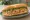 Bánh Mì Bì Heo: an illustration of pork, mayonnaise, đồ chua, cucumber and more on bánh mì baguette.
