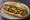 Bánh Mì Bò Mỹ: an illustration of beef, mayonnaise, đồ chua, cucumber and more on bánh mì baguette.