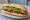 Bánh Mì Bò Nướng Sả: an illustration of beef, mayonnaise, đồ chua, cucumber and more on bánh mì baguette.