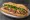Bánh Mì Bò Tái: an illustration of beef, mayonnaise, đồ chua, cucumber and more on bánh mì baguette.
