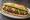 Bánh Mì Bulgogi: an illustration of beef, mayonnaise, đồ chua, cucumber and more on bánh mì baguette.