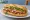 Bánh Mì Cá Mòi: an illustration of sardine, mayonnaise, đồ chua, cucumber and more on bánh mì baguette.