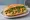 Bánh Mì Chả Cá Hà Nội: an illustration of fish, đồ chua, cucumber, cilantro and more on bánh mì baguette.