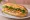 Bánh Mì Chả Chay: an illustration of mock meat, đồ chua, cucumber, cilantro and more on bánh mì baguette.