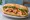 Bánh Mì Chả Chiên: an illustration of pork, chả lụa, đồ chua, cucumber and more on bánh mì baguette.