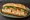 Bánh Mì Chả Trứng: an illustration of pork, egg, đồ chua, cucumber and more on bánh mì baguette.