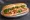 Bánh Mì Chay: an illustration of mock meat, đồ chua, cucumber, cilantro and more on bánh mì baguette.