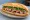 Bánh Mì Dân Tổ: an illustration of pork, pâté, đồ chua, cucumber and more on bánh mì baguette.