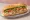 Bánh Mì Gà Luộc: an illustration of chicken, ginger, lime, đồ chua and more on bánh mì baguette.