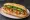 Bánh Mì Gà Xào Gừng: an illustration of chicken, ginger, đồ chua, cucumber and more on bánh mì baguette.