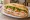 Bánh Mì Giò Lụa: an illustration of chả lụa, pork, pâté, mayonnaise and more on bánh mì baguette.