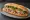 Bánh Mì Giò Thủ: an illustration of pork, ham, pâté, mayonnaise and more on bánh mì baguette.