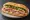 Bánh Mì Huỳnh Hoa: an illustration of pork, chả lụa, pâté, mayonnaise and more on bánh mì baguette.