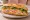 Bánh Mì Jambon: an illustration of ham, pâté, mayonnaise, đồ chua and more on bánh mì baguette.