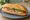 Bánh Mì Jambon Bơ: an illustration of ham and butter on bánh mì baguette.