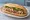 Bánh Mì Lòng Heo: an illustration of đồ chua, cucumber and cilantro on bánh mì baguette.