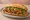 Bánh Mì Phá Lấu Sài Gòn: an illustration of pork, đồ chua, cucumber, cilantro and more on bánh mì baguette.