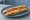 Bánh Mì Que: an illustration of pâté on bánh mì baguette.