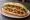 Bánh Mì Rau Củ: an illustration of đồ chua, cucumber, cilantro and pepper on bánh mì baguette.
