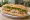 Bánh Mì San Jose: an illustration of pork, chả lụa, pâté, mayonnaise and more on bánh mì baguette.