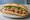Bánh Mì Steak: an illustration of beef, mayonnaise, đồ chua, cucumber and more on bánh mì baguette.