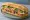 Bánh Mì Sydney: an illustration of pork, chả lụa, pâté, mayonnaise and more on bánh mì baguette.