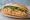 Bánh Mì Trứng Chiên Thịt: an illustration of egg, pork, đồ chua, cucumber and more on bánh mì baguette.