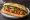 Bánh Mì Xíu Mại Sốt Cà: an illustration of pork, tomato, ketchup, đồ chua and more on bánh mì baguette.