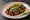 BBQ Brisket Taco: an illustration of beef and bbq sauce on tortilla.