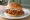 BBQ Chicken Sandwich: an illustration of chicken and bbq sauce on burger bun.