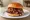BBQ Sandwich (Global Export): an illustration of beef, pork and bbq sauce on burger bun.