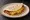 Bean and Cheese Taco: an illustration of beans and cheese on tortilla.