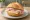 Belegtes Brötchen: an illustration of butter and cheese on kaiser roll.