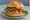 Cajun Crab Cake Sandwich at Homemade Cafe: an illustration of the sandwich.