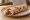 Beyti Kebab Dürüm: an illustration of lamb, marinara and yogurt on pita.